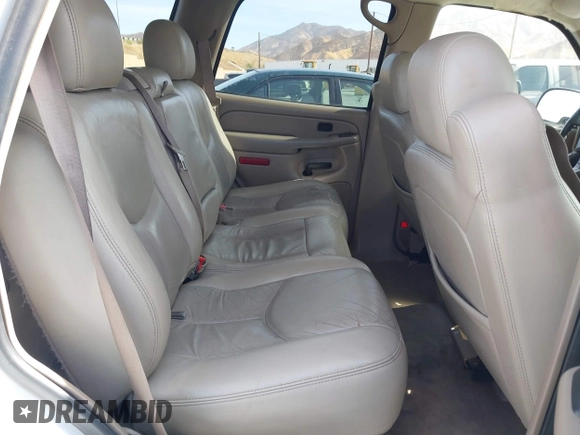 2005 GMC Yukon SLT z VIN 1GKEC13T05R273813, wystawiony jako IAAI lot #40796306 z przebiegiem 239 435 mil mil oraz . Historia ofert i sprzedaży dostępna na DreamBid. Obrazek 8.