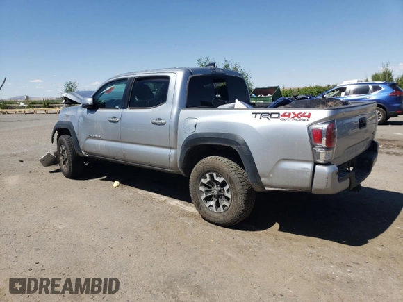 2022 Toyota Tacoma SR with VIN 3TMCZ5AN4NM470997, listed as a Copart auction lot 55165855 with 67,161 mi miles and Salvage title. Bid and sale history available at DreamBid. Image 2.