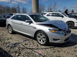 2012 Ford Taurus SEL z VIN 1FAHP2HW7CG138459, wystawiony jako Copart lot #53170075 z przebiegiem 194 617 mil mil oraz Czysty tytuł • Clean title. Historia ofert i sprzedaży dostępna na DreamBid. Obrazek 4.
