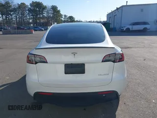 2023 Tesla Model Y Performance with VIN 7SAYGDEF3PF711497, listed as a IAAI auction lot 41877450 with 21,887 mi miles and . Bid and sale history available at DreamBid. Image 16.