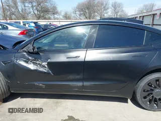 2022 Tesla Model 3 Performance with VIN 5YJ3E1EC6NF104475, listed as a IAAI auction lot 41734724 with 31,717 mi miles and . Bid and sale history available at carsss.com. Image 14.