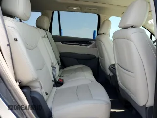 2021 Cadillac XT6 Premium Luxury z VIN 1GYKPCRS5MZ197527, wystawiony jako Copart lot #55952185 z przebiegiem 24 856 mil mil oraz Szkody całkowita. Historia ofert i sprzedaży dostępna na DreamBid. Obrazek 11.