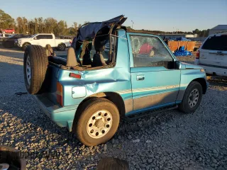 1992 Suzuki Sidekick z VIN 2S3TC01C2N6405497, wystawiony jako Copart lot #75856164 z przebiegiem 38 423 mil mil oraz Szkody całkowita. Historia ofert i sprzedaży dostępna na DreamBid. Obrazek 3.
