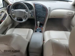 2001 Oldsmobile Aurora z VIN 1G3GS64CX14180971, wystawiony jako Copart lot #79035554 z przebiegiem 62 228 mil mil oraz Szkody całkowita. Historia ofert i sprzedaży dostępna na DreamBid. Obrazek 8.