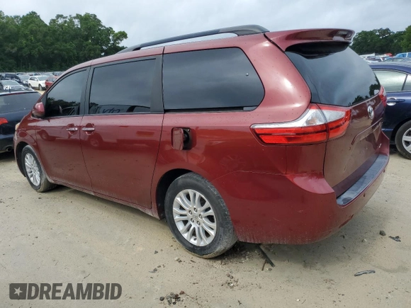 2015 Toyota Sienna XLE with VIN 5TDYK3DC4FS643881, listed as a Copart auction lot 56684635 with 137,781 mi miles and Salvage Title. Bid and sale history available at DreamBid. Image 2.