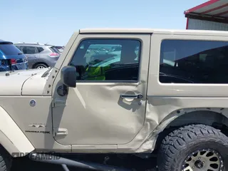 2018 Jeep Wrangler Sahara z VIN 1C4AJWBGXJL811092, wystawiony jako IAAI lot #42305620 z przebiegiem 41 021 mil mil oraz . Historia ofert i sprzedaży dostępna na DreamBid. Obrazek 14.