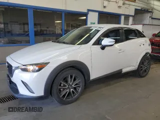 2017 Mazda CX-3 Touring with VIN JM1DKFC76H0148124, listed as a Copart auction lot 51866325 with 100,512 mi miles and Salvage Title. Bid and sale history available at carsss.com. Image 1.