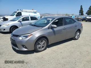 2014 Toyota Corolla L with VIN 5YFBURHE9EP109765, listed as a Copart auction lot 58167175 with 67,806 mi miles and Salvage title. Bid and sale history available at DreamBid. Image 1.
