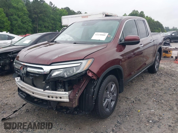 2020 Honda Ridgeline RTL-E with VIN 5FPYK3F7XLB012298, listed as a IAAI auction lot 42230880 with 48,252 mi miles and . Bid and sale history available at DreamBid. Image 2.