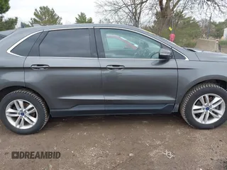 2016 Ford Edge SEL z VIN 2FMPK3J8XGBC40773, wystawiony jako IAAI lot #42129409 z przebiegiem 169 836 mil mil oraz . Historia ofert i sprzedaży dostępna na DreamBid. Obrazek 13.