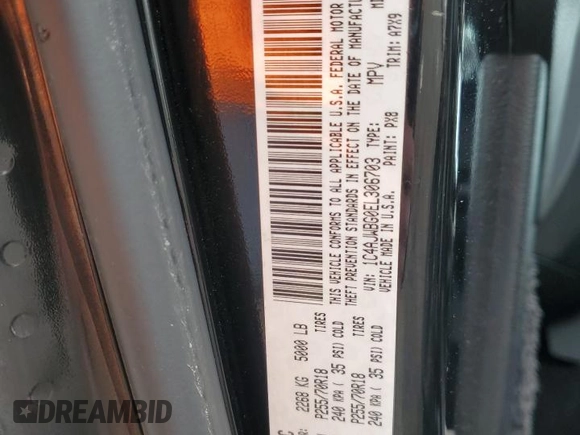 2014 Jeep Wrangler Sahara with VIN 1C4AJWBG0EL306703, listed as a Copart auction lot 51450215 with 115,932 mi miles and Salvage Title. Bid and sale history available at DreamBid. Image 13.