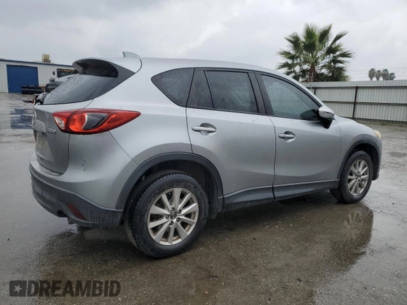 2015 Mazda CX-5 Touring with VIN JM3KE2CY4F0469096, listed as a Copart auction lot 48075105 with 131,788 mi miles and Salvage Title. Bid and sale history available at carsss.com. Image 3.