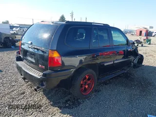 2002 GMC Envoy SLT z VIN 1GKDT13S522146661, wystawiony jako IAAI lot #40502587 z przebiegiem 274 877 mil mil oraz . Historia ofert i sprzedaży dostępna na DreamBid. Obrazek 4.