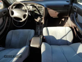 1992 Toyota Camry LE with VIN 4T1SK12E6NU059325, listed as a Copart auction lot 80712404 with 163,685 mi miles and Salvage Title. Bid and sale history available at carsss.com. Image 8.