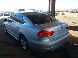 2014 Volkswagen Passat Wolfsburg Ed with VIN 1VWAT7A38EC051892, listed as a IAAI auction lot 41523058 with 122,493 mi miles. Bid and sale history available at carsss.com. Image 3.
