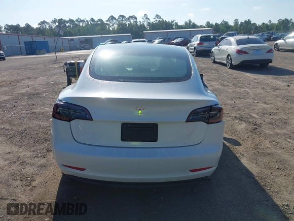 2023 Tesla Model 3 with VIN 5YJ3E1EA9PF557880, listed as a IAAI auction lot 42481413 with 40,582 mi miles and . Bid and sale history available at DreamBid. Image 15.