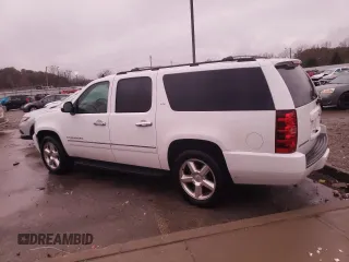 2009 Chevrolet Suburban LTZ with VIN 1GNFC36019J122990, listed as a Copart auction lot 79067174 with 167,632 mi miles and Salvage title. Bid and sale history available at DreamBid. Image 2.