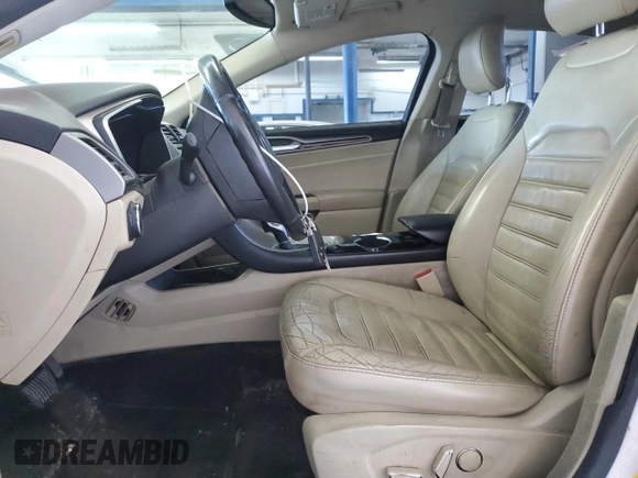 2014 Ford Fusion SE Hybrid with VIN 3FA6P0LU7ER349951, listed as a Copart auction lot 48247925 with 197,441 mi miles and Salvage Title. Bid and sale history available at DreamBid. Image 7.