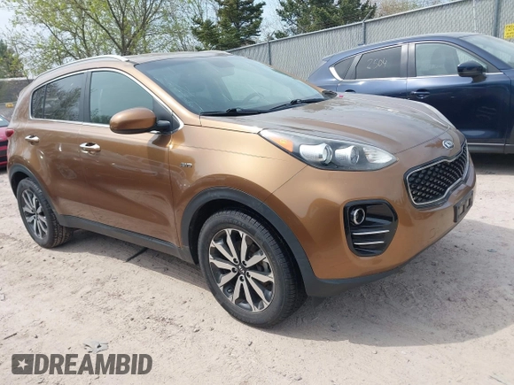 2017 Kia Sportage EX z VIN KNDPNCAC3H7113373, wystawiony jako IAAI lot #42221002 z przebiegiem 112 931 mil mil oraz . Historia ofert i sprzedaży dostępna na DreamBid. Obrazek 1.