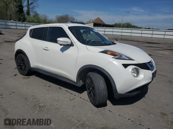 2015 Nissan Juke S with VIN JN8AF5MV5FT555169, listed as a Copart auction lot 54141895 with 122,962 mi miles and Salvage Title. Bid and sale history available at DreamBid. Image 4.
