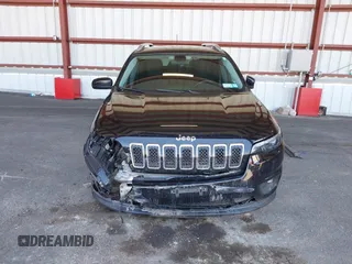 2019 Jeep Cherokee Latitude z VIN 1C4PJLCB1KD444428, wystawiony jako IAAI lot #42157384 z przebiegiem 58 948 mil mil oraz . Historia ofert i sprzedaży dostępna na DreamBid. Obrazek 12.