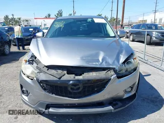 2014 Mazda CX-5 Grand Touring with VIN JM3KE2DY0E0331942, listed as a IAAI auction lot 41750533 with 163,387 mi miles. Bid and sale history available at carsss.com. Image 12.