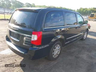 2014 Chrysler Town & Country Touring with VIN 2C4RC1BG1ER453684, listed as a IAAI auction lot 42111596 with 115,572 mi miles. Bid and sale history available at carsss.com. Image 4.