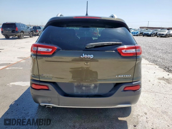 2015 Jeep Cherokee Limited with VIN 1C4PJLDB3FW572761, listed as a Copart auction lot 52529045 with 101,302 mi miles and Salvage Title. Bid and sale history available at DreamBid. Image 6.