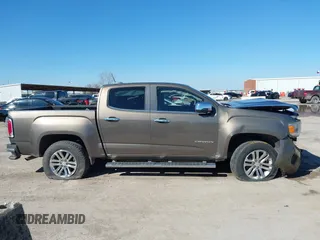 2015 GMC Canyon 2WD SLT with VIN 1GTG5CE32F1215628, listed as a IAAI auction lot 41412762 with 182,615 mi miles. Bid and sale history available at carsss.com. Image 13.