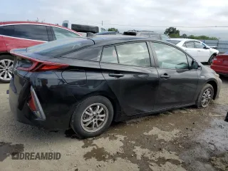 2021 Toyota Prius LE with VIN JTDKAMFP7M3178896, listed as a Copart auction lot 55634965 with 48,576 mi miles and Salvage Title. Bid and sale history available at DreamBid. Image 3.