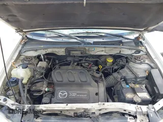 2001 Mazda Tribute LX with VIN 4F2YU09131KM12857, listed as a IAAI auction lot 42034605 with 257,015 mi miles and . Bid and sale history available at carsss.com. Image 10.