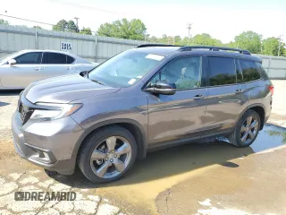 2021 Honda Passport Touring z VIN 5FNYF7H97MB011307, wystawiony jako Copart lot #52310415 z przebiegiem 72 118 mil mil oraz Szkody całkowita. Historia ofert i sprzedaży dostępna na DreamBid. Obrazek 1.