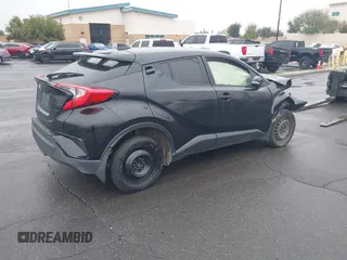 2021 Toyota C-HR LE with VIN JTNKHMBX9M1116943, listed as a IAAI auction lot 41369464 with Not Provided miles. Bid and sale history available at carsss.com. Image 4.