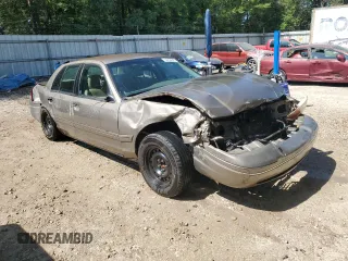 2003 Ford Crown Victoria LX z VIN 2FAFP74W33X141881, wystawiony jako Copart lot #54204695 z przebiegiem 98 466 mil mil oraz Szkoda całkowita • Salvage title. Historia ofert i sprzedaży dostępna na DreamBid. Obrazek 4.