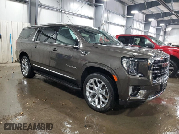 2021 GMC Yukon XL SLT with VIN 1GKS2GKD1MR434218, listed as a Copart auction lot 82777494 with 60,601 mi miles and Salvage Title. Bid and sale history available at carsss.com. Image 4.