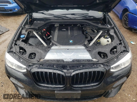 2021 BMW X4 M40i with VIN 5UX2V5C00M9H95699, listed as a Copart auction lot 63564433 with 33,500 mi miles and Salvage title. Bid and sale history available at DreamBid. Image 11.