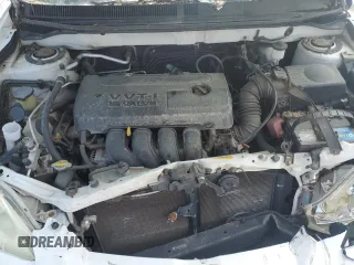 2005 Toyota Matrix STD z VIN 2T1LR30E05C415655, wystawiony jako Copart lot #55730185 z przebiegiem 124 487 mil mil oraz Szkody całkowita. Historia ofert i sprzedaży dostępna na DreamBid. Obrazek 11.
