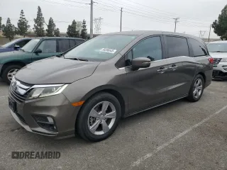 2018 Honda Odyssey EX-L z VIN 5FNRL6H77JB015200, wystawiony jako Copart lot #58356645 z przebiegiem 121 672 mil mil oraz Szkoda całkowita • Salvage title. Historia ofert i sprzedaży dostępna na DreamBid. Obrazek 1.