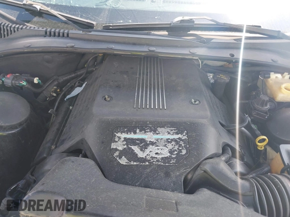 2003 Ford Thunderbird Deluxe z VIN 1FAHP60A33Y110451, wystawiony jako IAAI lot #42133863 z przebiegiem Nie podano mil oraz . Historia ofert i sprzedaży dostępna na DreamBid. Obrazek 10.