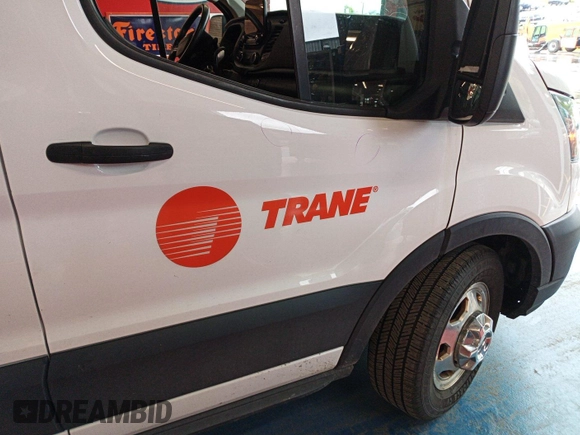 2021 Ford Transit Cargo with VIN 1FTBR2YG2MKA51800, listed as a IAAI auction lot 42793917 with 61,733 mi miles and . Bid and sale history available at DreamBid. Image 10.