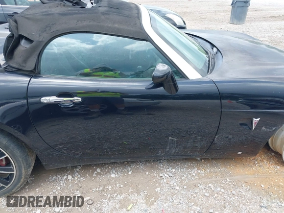 2007 Pontiac Solstice GXP z VIN 1G2MG35X17Y125299, wystawiony jako IAAI lot #42168624 z przebiegiem 123 526 mil mil oraz . Historia ofert i sprzedaży dostępna na DreamBid. Obrazek 13.