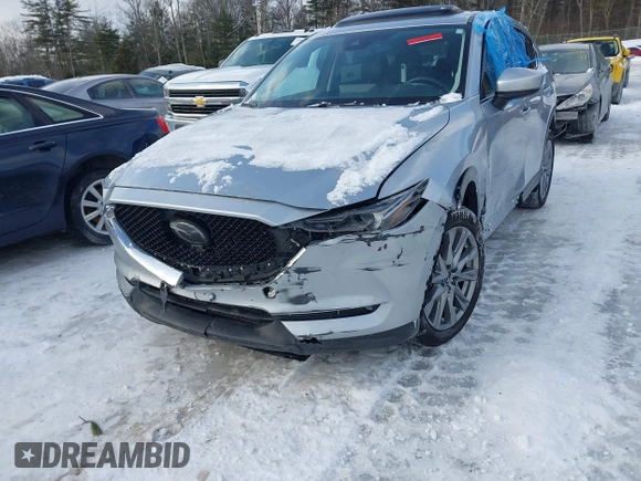 2021 Mazda CX-5 Grand Touring Reserve with VIN JM3KFBAY0M0377030, listed as a IAAI auction lot 41606709 with 39,590 mi miles. Bid and sale history available at carsss.com. Image 6.