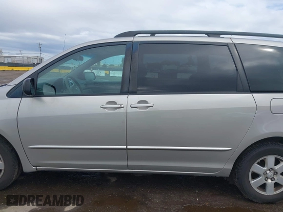 2005 Toyota Sienna CE with VIN 5TDZA23C55S264700, listed as a IAAI auction lot 41878179 with 293,934 mi miles. Bid and sale history available at carsss.com. Image 14.