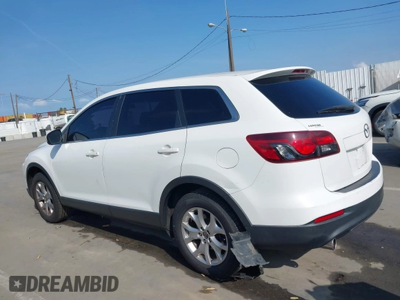 2015 Mazda CX-9 Sport with VIN JM3TB2BAXF0453244, listed as a IAAI auction lot 41905847 with 128,764 mi miles and . Bid and sale history available at carsss.com. Image 14.