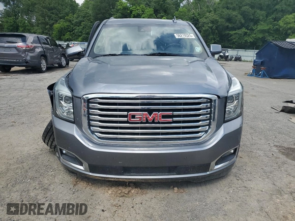 2019 GMC Yukon XL SLT z VIN 1GKS1GKC0KR325305, wystawiony jako Copart lot #56219325 z przebiegiem 136 295 mil mil oraz Szkoda całkowita • Salvage title. Historia ofert i sprzedaży dostępna na DreamBid. Obrazek 5.