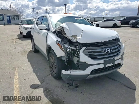 2018 Hyundai Santa Fe 2.4L z VIN 5NMZTDLB1JH076587, wystawiony jako Copart lot #51484585 z przebiegiem 106 026 mil mil oraz Szkoda całkowita • Salvage title. Historia ofert i sprzedaży dostępna na DreamBid. Obrazek 11.