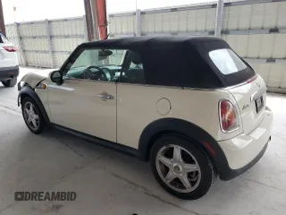 2010 MINI Convertible with VIN WMWMR3C59ATU98597, listed as a Copart auction lot 53336025 with 88,273 mi miles and Salvage Title. Bid and sale history available at DreamBid. Image 2.