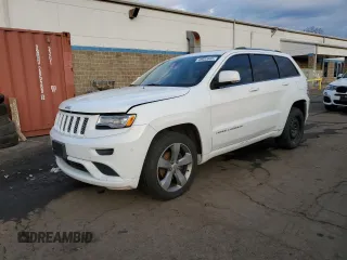 2015 Jeep Grand Cherokee Summit with VIN 1C4RJFJG6FC925490, listed as a Copart auction lot 48932665 with 163,460 mi miles and Salvage title. Bid and sale history available at DreamBid. Image 1.
