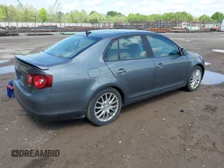 2008 Volkswagen Jetta Sedan Wolfsburg with VIN 3VWRJ71K58M185147, listed as a IAAI auction lot 42076387 with 193,621 mi miles. Bid and sale history available at carsss.com. Image 4.