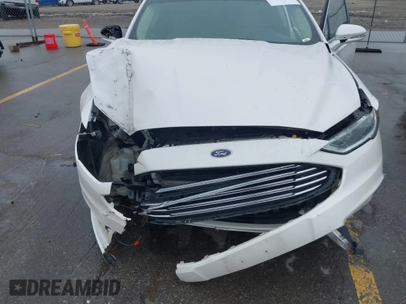 2017 Ford Fusion Hybrid Titanium с VIN 3FA6P0RUXHR317572, выставлен на аукционе IAAI как лот 42170169 с пробегом 138 987 миль миль и . История ставок и продаж доступна на DreamBid. Изображение 6.